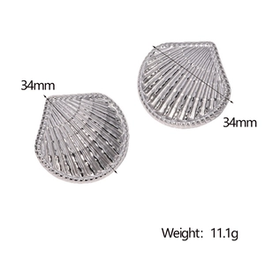 Detailed view of silver shell-shaped earrings with 34mm size and 11.1g weight display