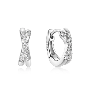 Close-up of S925 sterling silver hallmarking and zircon stones on crisscross earrings