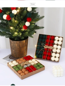 Close-up of handmade 3cm wool felt balls in vintage colors for Christmas tree decoration
