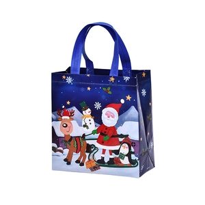 Christmas theme non-woven gift bag in navy blue featuring Santa and reindeer prints