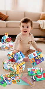 Detail of baby tissue box toy with colorful printed cloth sheets and mesh fabrics