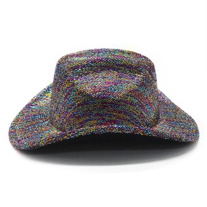 Close-up of vibrant multicolored metallic woven western cowboy hat with wide brim