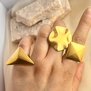Three-piece geometric 18K gold plated stainless steel rings set for women on hand