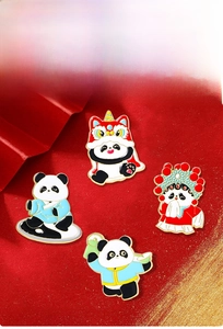 Detailed view of four Chinese style panda enamel pins with lion dance and opera themes