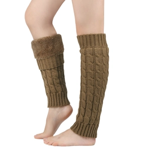 Detailed knit texture of brown leg warmers with plush cuffs on a white background