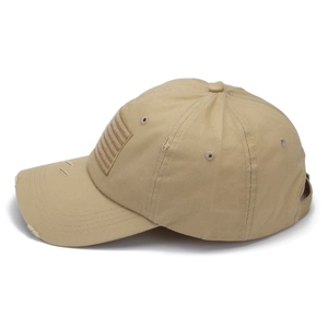Close-up of a khaki distressed baseball cap with a vintage American flag patch detail