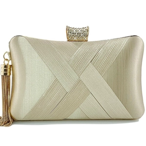 Champagne gold woven evening clutch bag with sparkling crystal clasp and metallic tassels