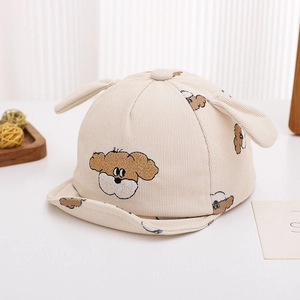 Detailed view of beige corduroy baby baseball cap with 3D puppy ears and embroidery