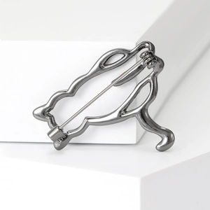 Minimalist cat alloy brooch in gunmetal finish, abstract animal pin on white background