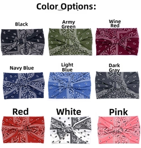 Close-up of bohemian paisley cotton headbands in nine different colors with twist detail