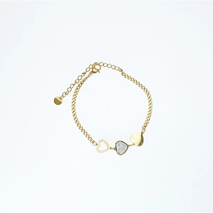 Gold-plated heart charm bracelet featuring hollow, crystal-paved, and smooth polished hearts