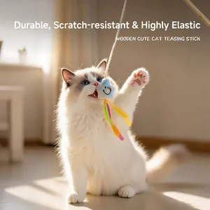 Bacchetta gioco per gatti in legno con stella di peluche blu e nastri colorati vivaci