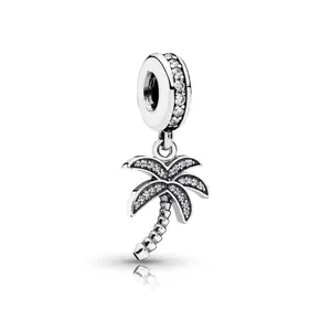 Silver coconut tree charm pendant with sparkling white zircon inlay and realistic textures