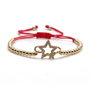 Adjustable red cord bracelet with gold star charm and sparkling cubic zirconia stones