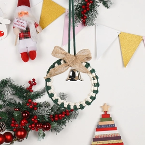 Handmade Christmas woven wreath with green cotton rope, jute bow and silver bell charm