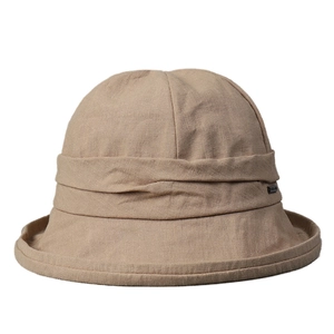 Minimalist beige linen bucket hat for women with pleated band and rolled brim details