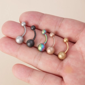 Set of five frosted stainless steel belly rings in silver black rainbow and gold