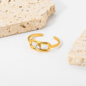 Close-up of 18K gold plated stainless steel ring with oval frame and round zircon