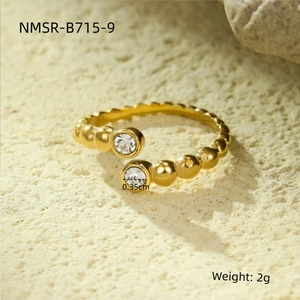 Gold beaded open ring with square zircon stones and 0.35cm detail on stone texture