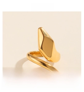 Detail view of the 18K gold plated snake ring showing its unique liquid metal texture