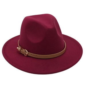 Detail view of burgundy wool fedora hat featuring a brown leather band and gold buckle