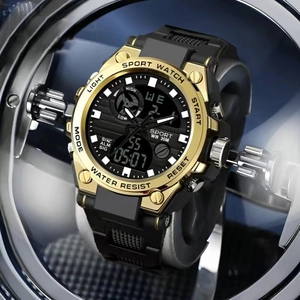 Detail of sport digital watch with golden bezel and black rubber strap for men