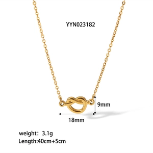 Detail of gold-plated knot heart pendant necklace with size and weight measurements