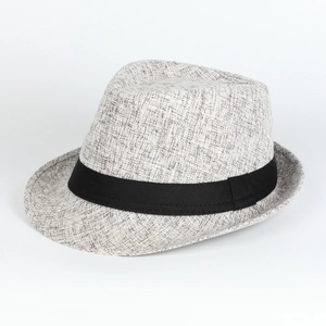 Close-up of the woven linen texture and matte black ribbon on this vintage fedora hat
