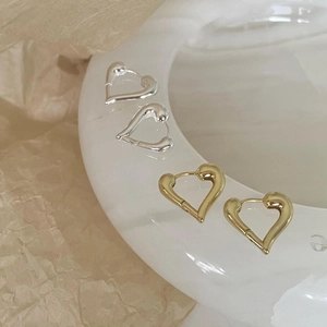 Minimalist sterling silver heart hoop earrings in gold and silver mirror finish