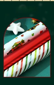 Detailed view of three Christmas wrapping paper rolls with festive Nutcracker and metallic patterns