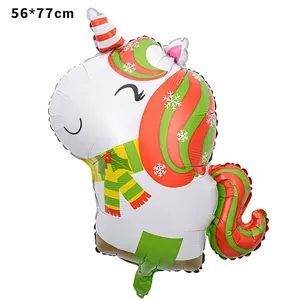 Detail of Christmas unicorn foil balloon in white with red and green stripes, 56x77cm