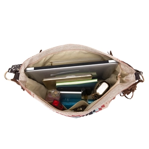 Spacious bohemian hand-woven tote bag showing organized interior and storage capacity