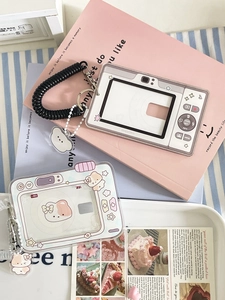 Detail of camera-shaped and bear acrylic card holders with colorful lanyards and charms