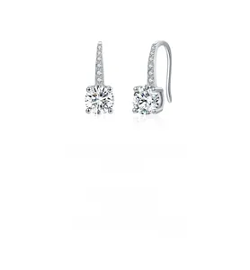 Detailed view of 1 carat moissanite silver drop earrings with elegant four-prong setting
