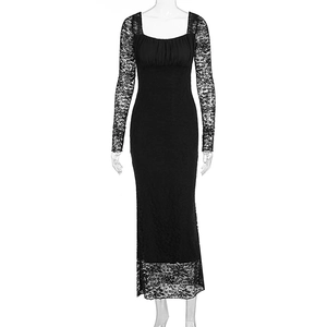 Close-up of sheer floral lace fabric and delicate texture on a black square neck dress