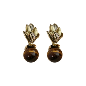 Vintage gold leaf earrings with crystals and hanging round tiger eye stones on white background