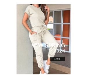 Detail of short sleeve t-shirt and drawstring high-waisted joggers in beige knit fabric