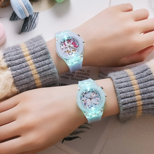 Detail of luminous unicorn quartz watch with LED glowing effect and soft silicone strap
