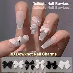 Delicate black and white 3D resin bowknot nail charms for professional manicure styling