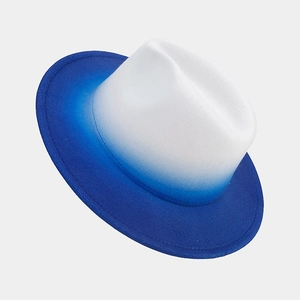 Detailed close-up of blue and white gradient felt fedora hat with a classic jazz crown
