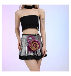 Detail of round purple clock purse with golden Roman numerals and metal chain strap
