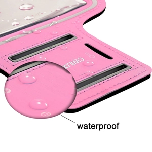 Pink waterproof touch screen sports armband with water droplets showing surface texture
