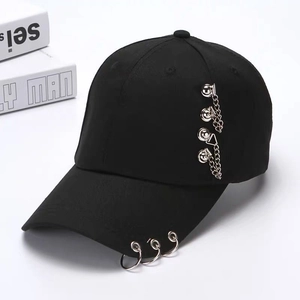 Punk style black baseball cap with silver metal rings and hanging chain decoration