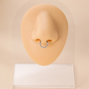 G23 titanium nose ring with cubic zirconia stones worn on realistic model septum