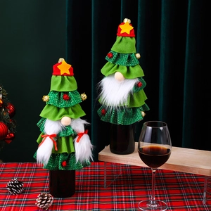 Christmas tree gnome wine bottle covers made of green knit fabric for festive table decor