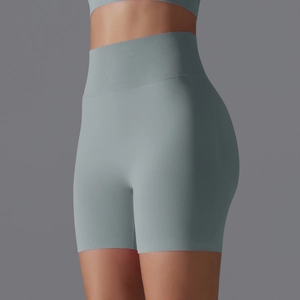 Detail of high waist seamless yoga shorts featuring ribbed tummy control in grey blue