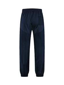 Detail view of dark blue waffle jogger pants featuring back pocket and elastic drawstring waist