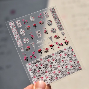 Detail of Peony Pavilion nail stickers featuring red floral motifs and Chinese patterns