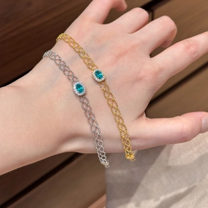 French vintage gold and silver bracelet featuring green zircon and beaded chain design