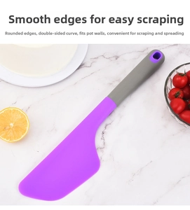 Detail of purple silicone spatula with ergonomic grey handle on marble background